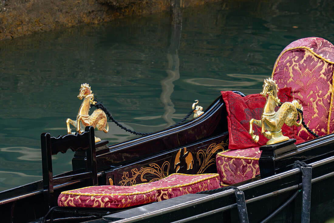 Detail of a gondola in Venice, Italy, showing brass seahorses.