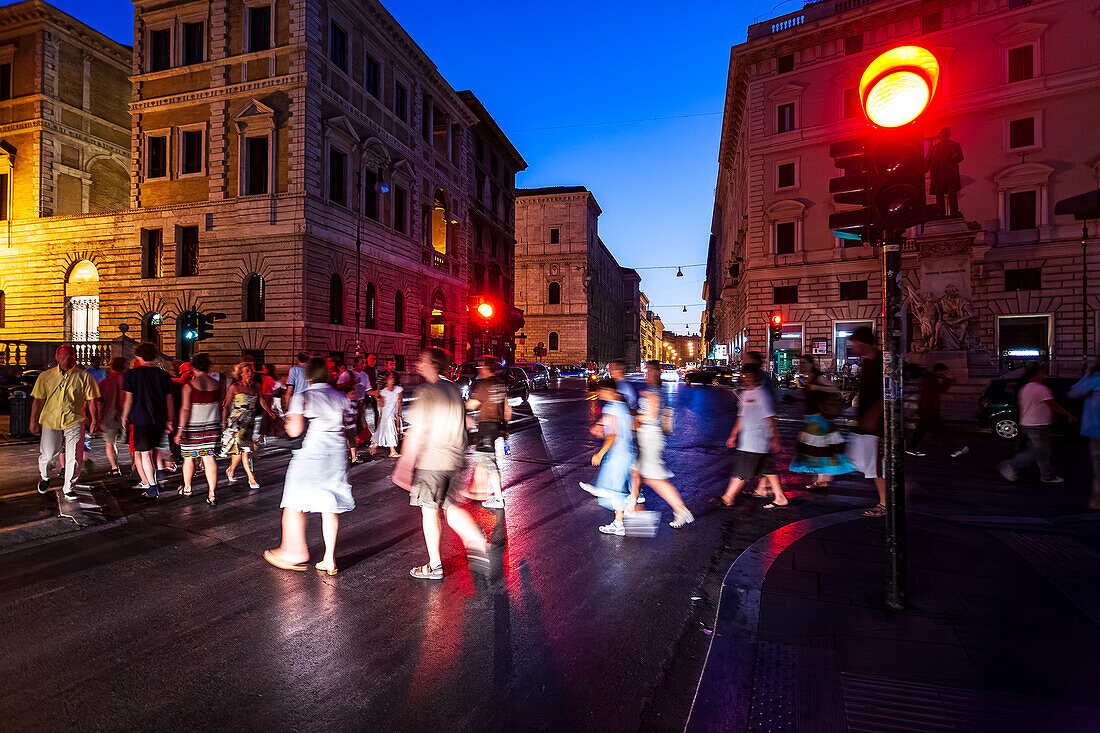 Rome, Italy, July 22 2017, Crowds of people walking at night in the vibrant city of Rome.