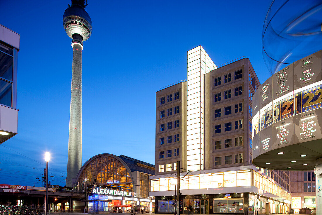 Berlin, Germany, July 29 2009, Alexanderplatz buzzes with activity at night, featuring the iconic Fernsehturm and modern architecture, illuminating Berlin\'s skyline.