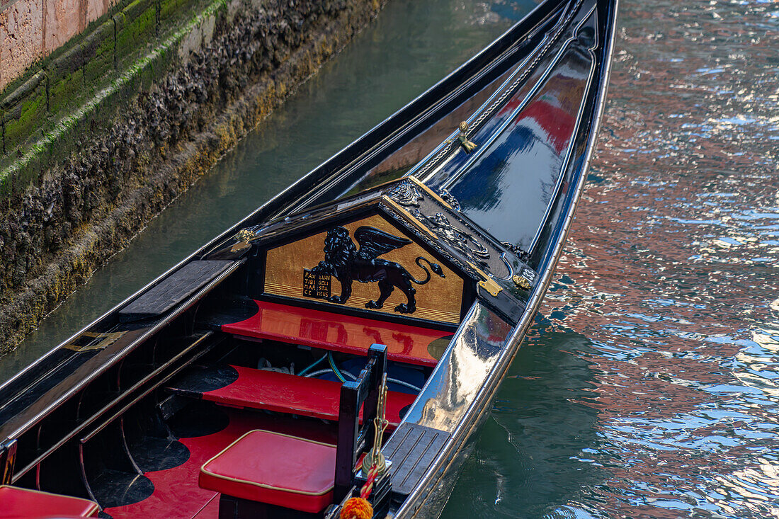 Detail of the traditional decoration of a gondola in Venice, Italy.