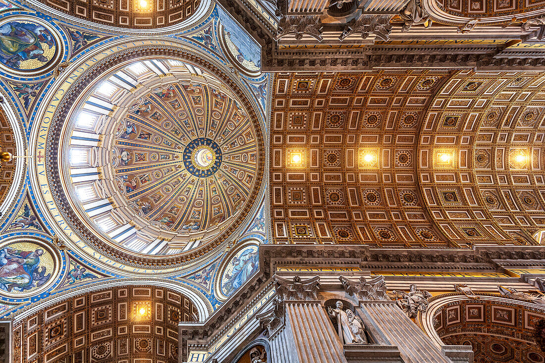 Rome, Italy, July 22 2017, Elaborately decorated ceiling and dome of St Peter's Basilica in Rome.