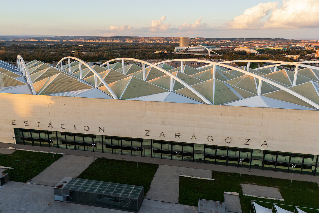 Aerial view of Zaragoza–Delicias railway and central bus station at sunset