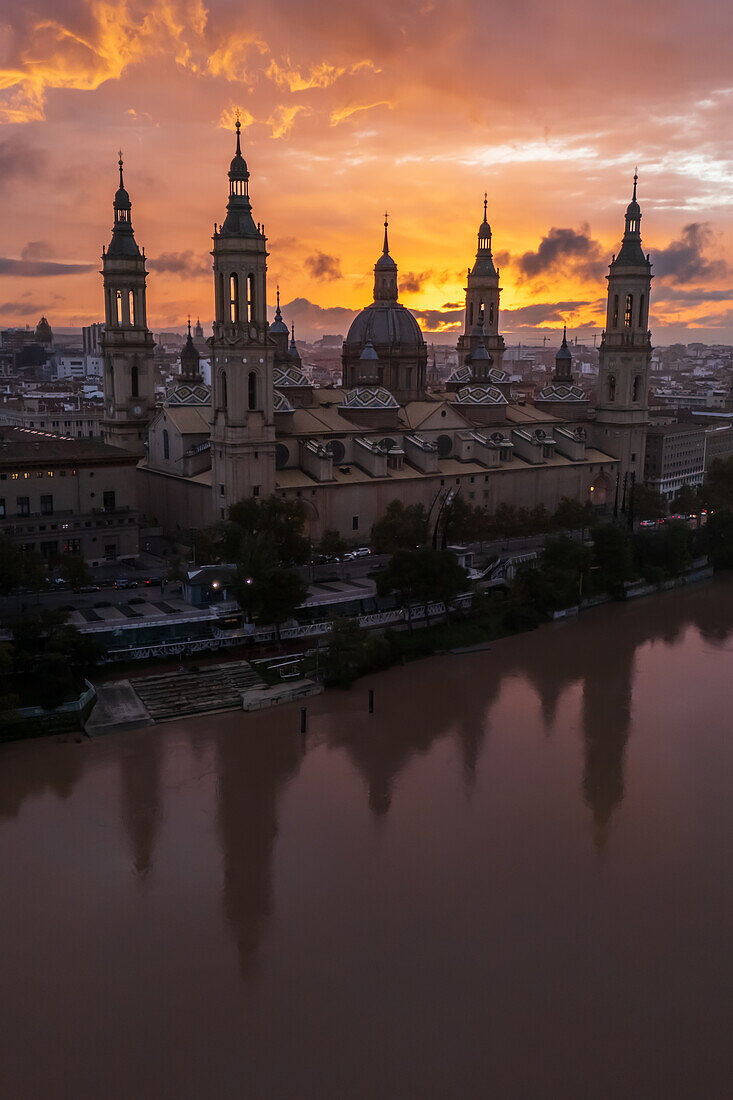 Aerial view of El Pilar Basilica Cathedral and the Ebro River at sunset, Zaragoza, Spain