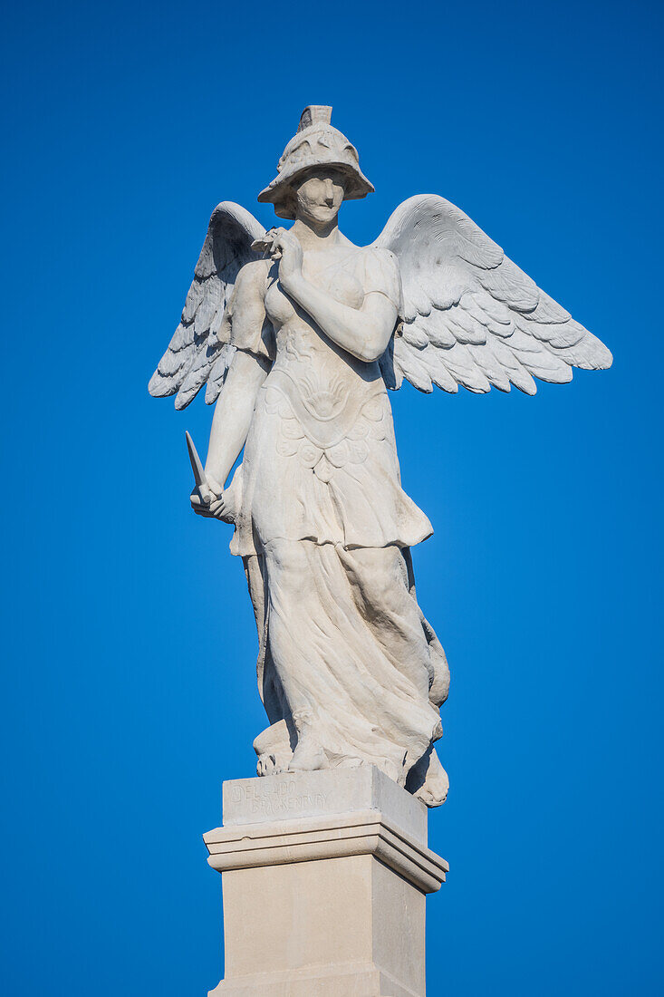 Close up of the Victoria Alada statue located in Plaza de America, Seville, Spain. This iconic sculpture represents victory and is situated in the historical Maria Luisa Park.