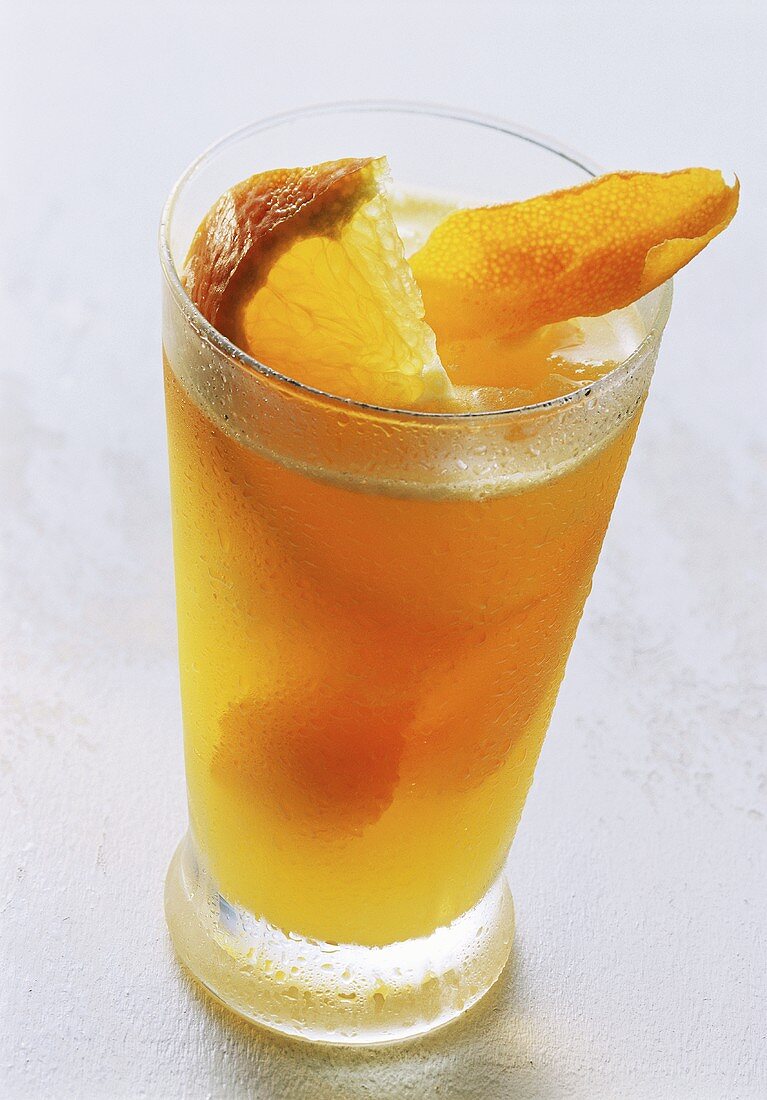 Orangendrink im Glas