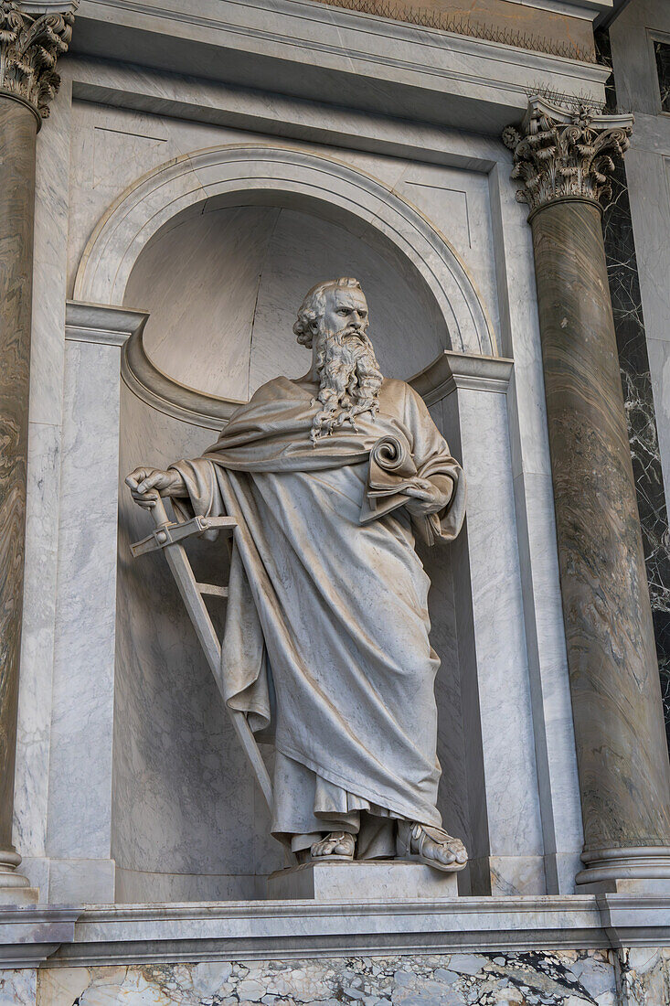 Statue of St. Paul on the portico of the Basilica of St. Paul Outside the Walls, Rome, Italy.