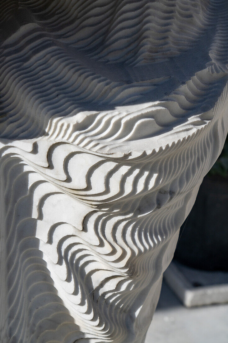 A sculpture roughed out with a CNC milling machine prior to hand finishing at a carving studio. Fantiscritti, Carrara, Italy.