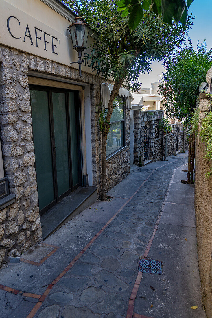 A narrow pedestrian street in the town of Capri, largest town on the island of Capri, Italy.