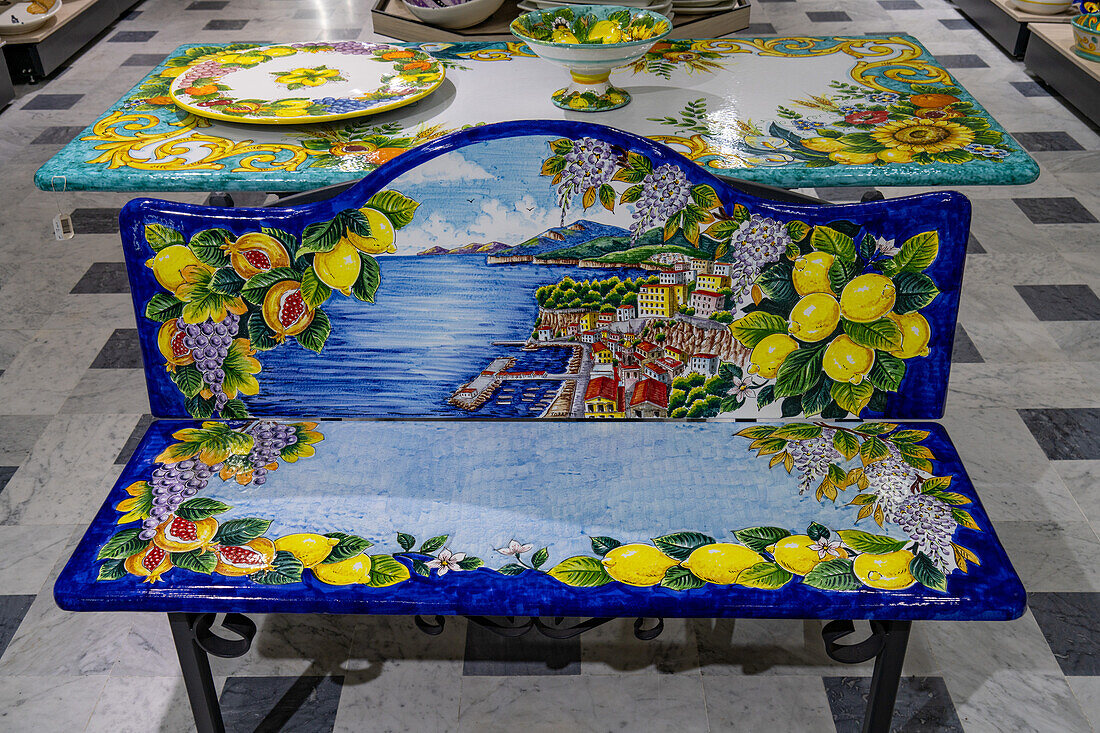 A ceramic bench with a lemon motif design & scene of Sorrento in the Campaniadamare shop in Sorrento, Italy.