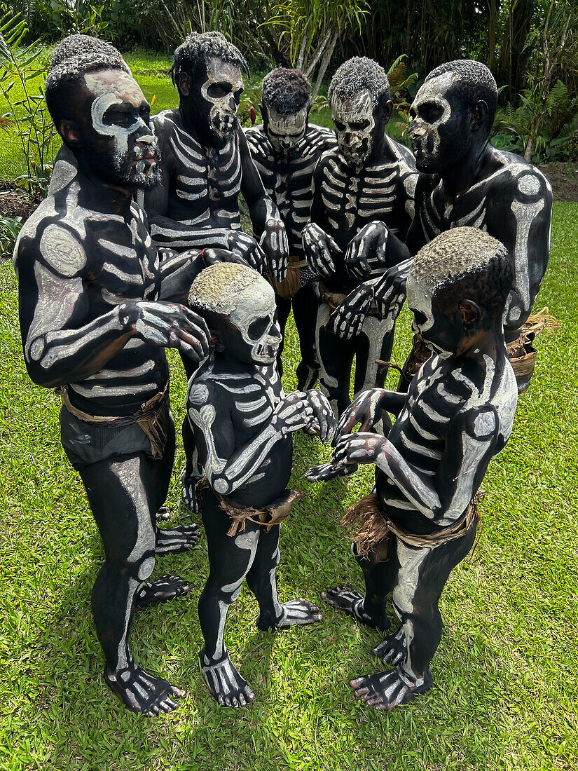 The Skeleton Men from the Omo Bugamo tribe of Papua New Guinea paint their bodies with black and white paint emulating the human skeleton, Chimbu Province, Papua New Guinea