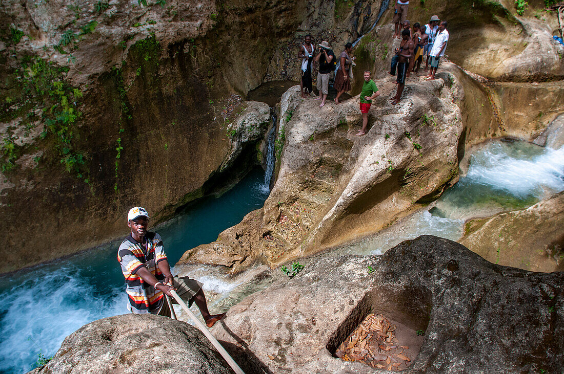 Exploring the cobalt waters of Bassin Bleu waterfall composed of bassin yes, bassin palmiste and bassin clair, Maire de Jacmel, Jacmel, Haiti