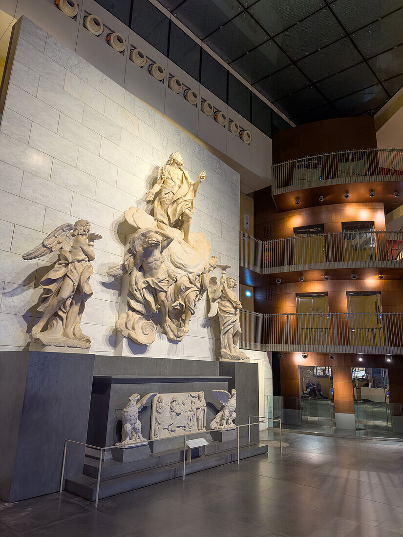 Entry hall of the Duomo Museum in Florence, Italy, with sculptures by Girolamo Ticciati on the wall.