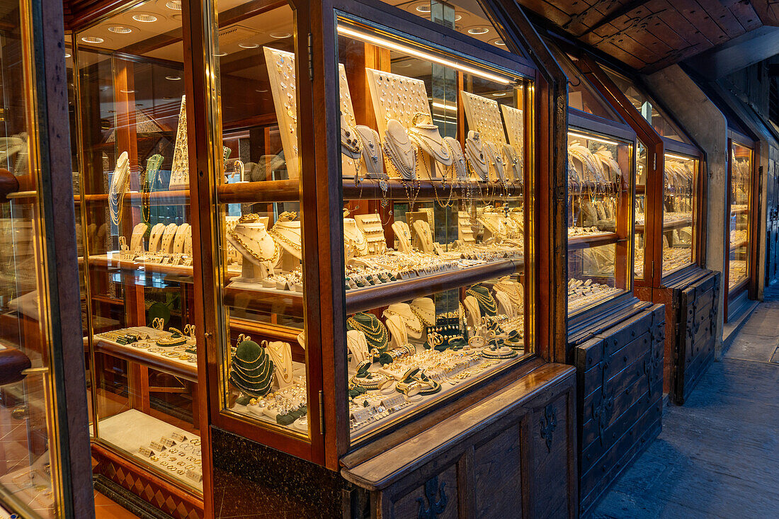 Luxury jewelry stores line the Ponte Vecchio bridge in Florence, Italy.