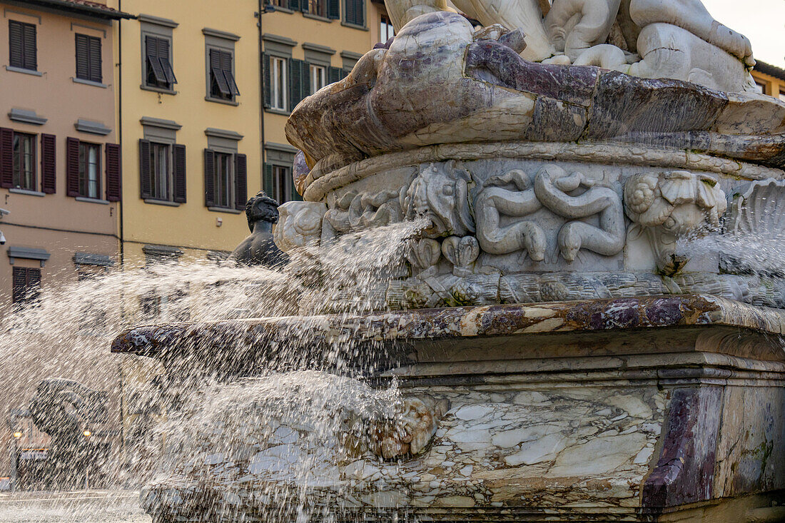 Detail of the Fountain of Neptune by Ammannati in the Piazza della Signoria in Florence, Italy. Water spews from the mouths of sea monsters.