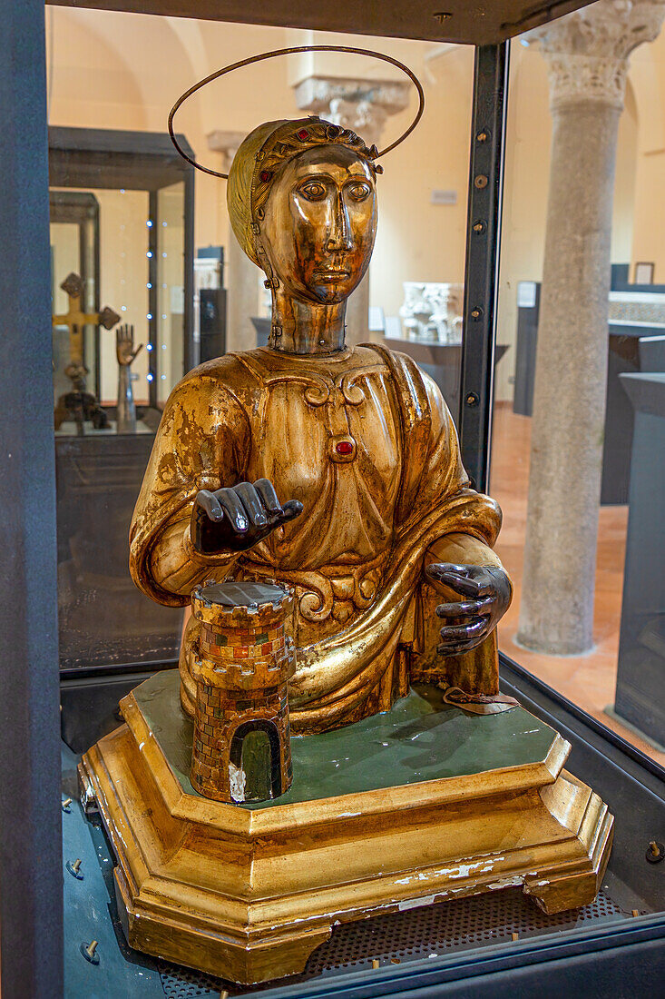 A wood & silver reliquary bust of Santa Barbara in the Museum of the Duomo of Ravello, Italy. The reliquary head contains her skull and dates from the 13th Century. The wooden bust was added in the 16th Century.