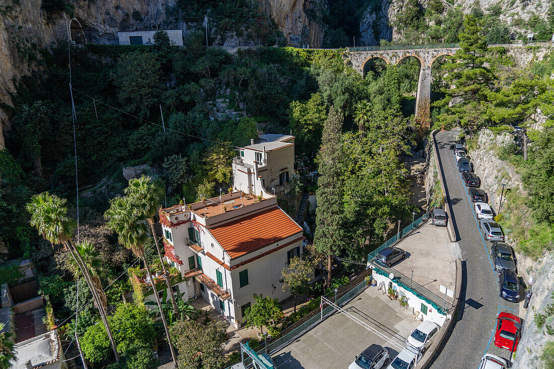 The road bridge above Marina di Praia, a resort area in the commune of Praiano on the Amalfi Coast of Italy.