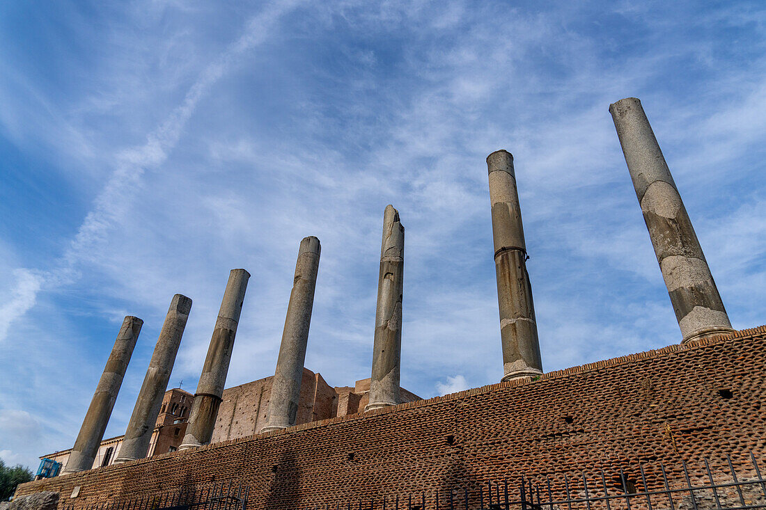 Roman columns along the Via Sacra in the Colosseum Archaeological Park in Rome, Italy.