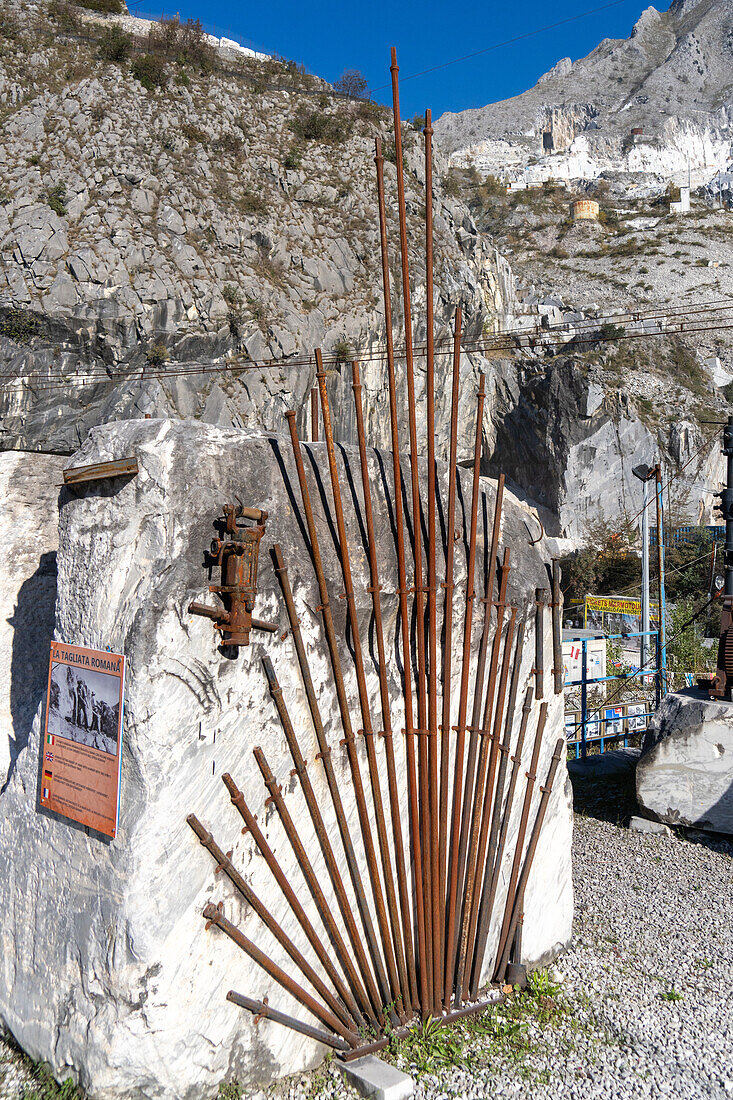 A display of drill bits and pneumatic drill for splitting marble blocks. Fantiscritti Quarry Museum, Carrara, Italy.