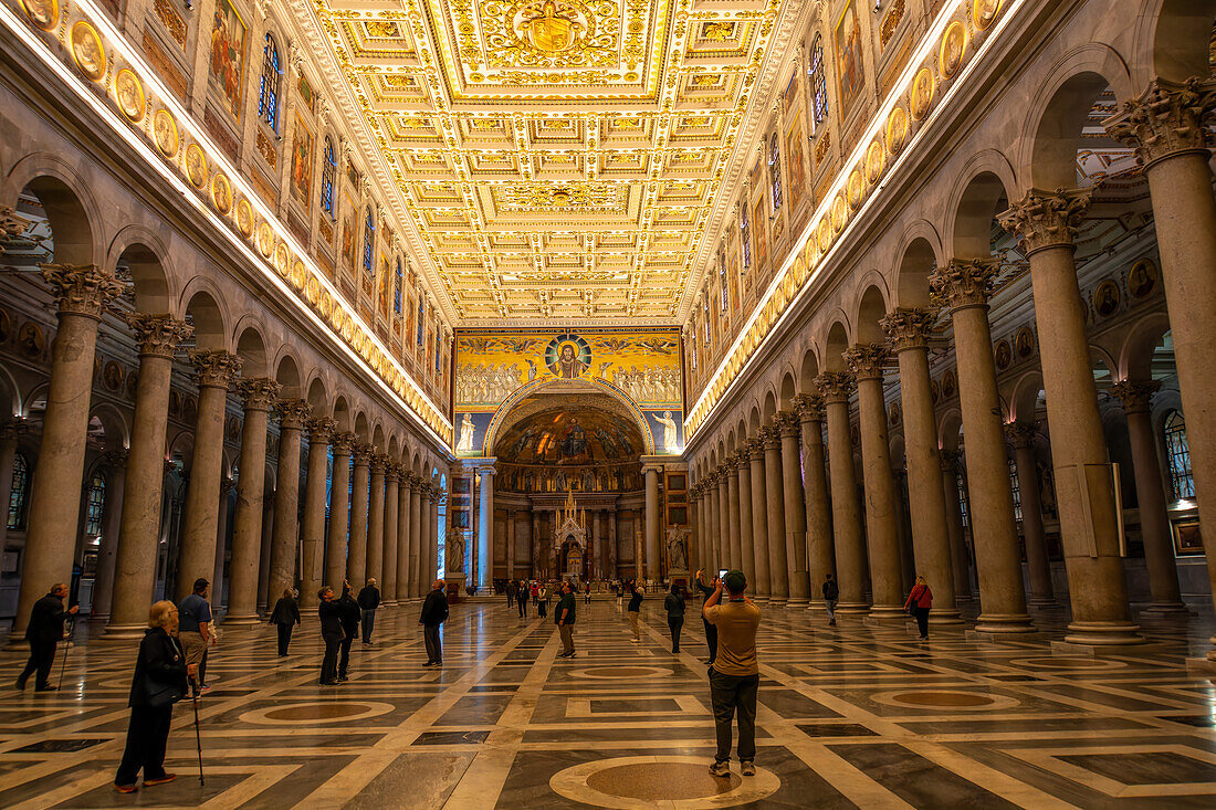 The central nave and triumphal arch in the Basilica of St. Paul Outside the Walls, Rome, Italy.