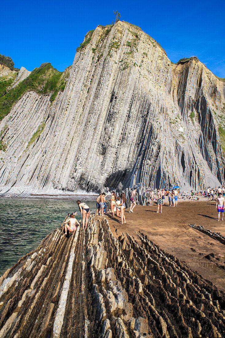 Itzurun beach and Flysch de Zumaia flysch, sedimentary rock formations, Basque Coast Geopark, Zumaia, Gipuzkoa, Basque Country, Spain