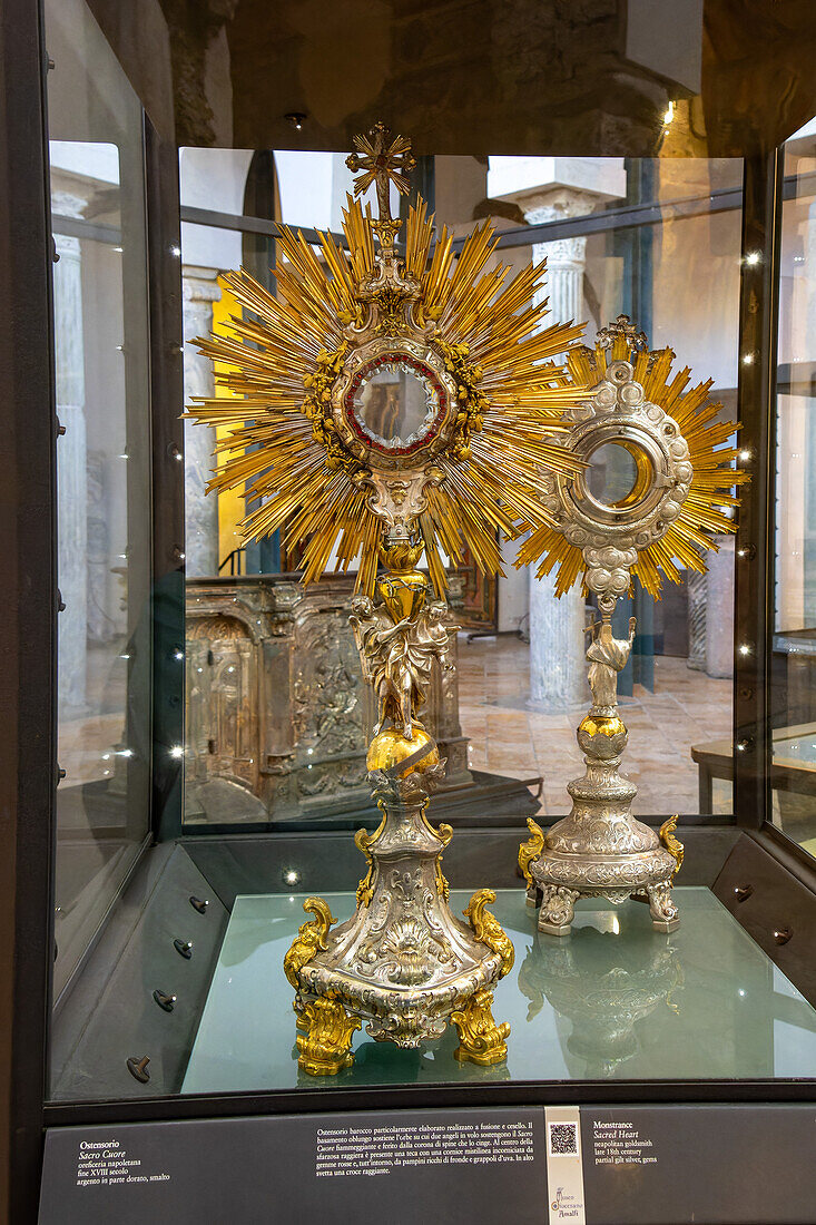 Gold & silver Baroque monstrances from the Cathedral Treasury in the Diocesan Museum of Amalfi, Italy. This museum is housed in the Basilica of the Crucifix, adjacent to the Amalfi Duomo.