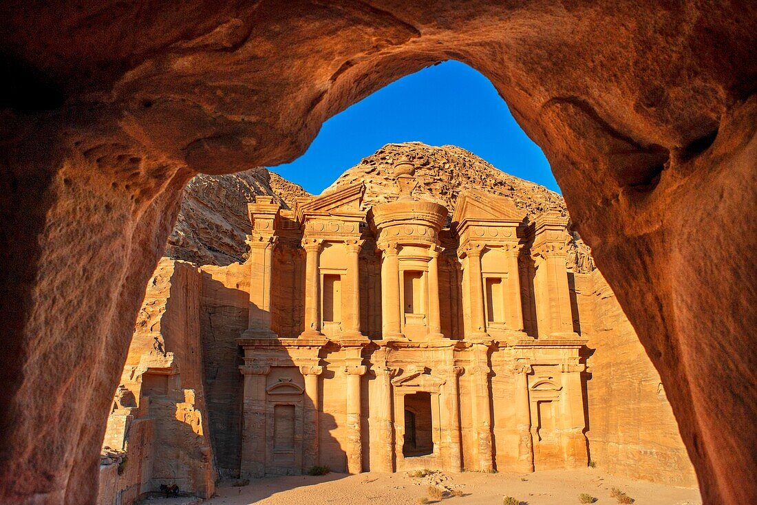 A view of The Monastery or Ad-Deir sculpted out of the rock, at Petra, Jordan. The Monastery of Petra is the largest of the magnificent carved tombs from the ancient necroplis that still exists.