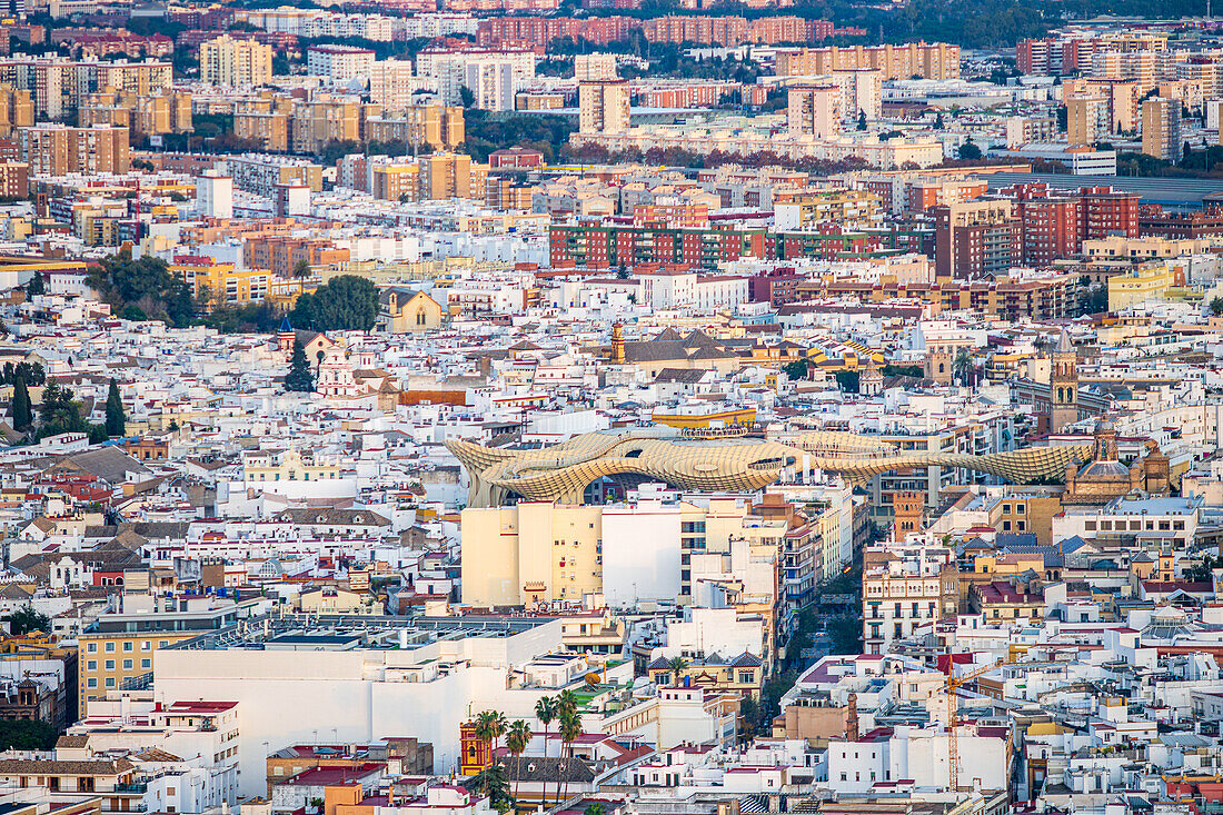 An overhead shot of Seville showcases the unique Las Setas structure against the skyline, blending modern and traditional architecture.