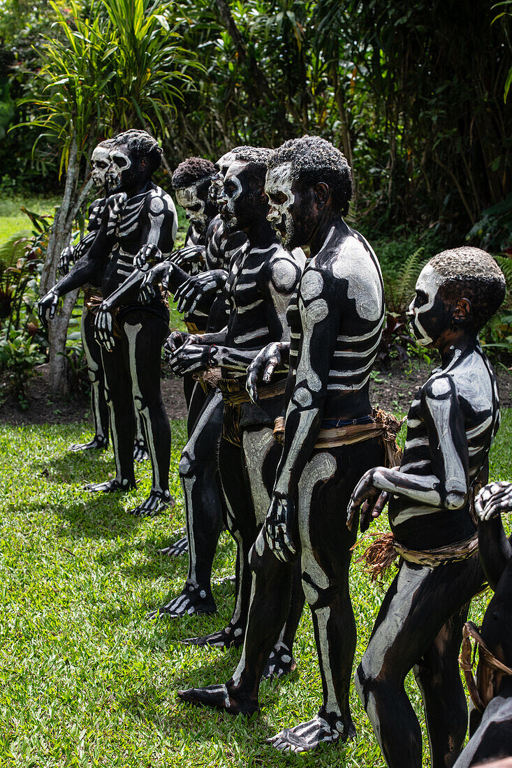 The Skeleton Men from the Omo Bugamo tribe of Papua New Guinea paint their bodies with black and white paint emulating the human skeleton, Chimbu Province, Papua New Guinea