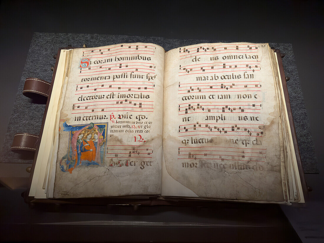 Choir book with illuminations in the Capella Musicale or Music Chapel in the Duomo Museum in Florence, Italy. circa 1310-1331 A.D.