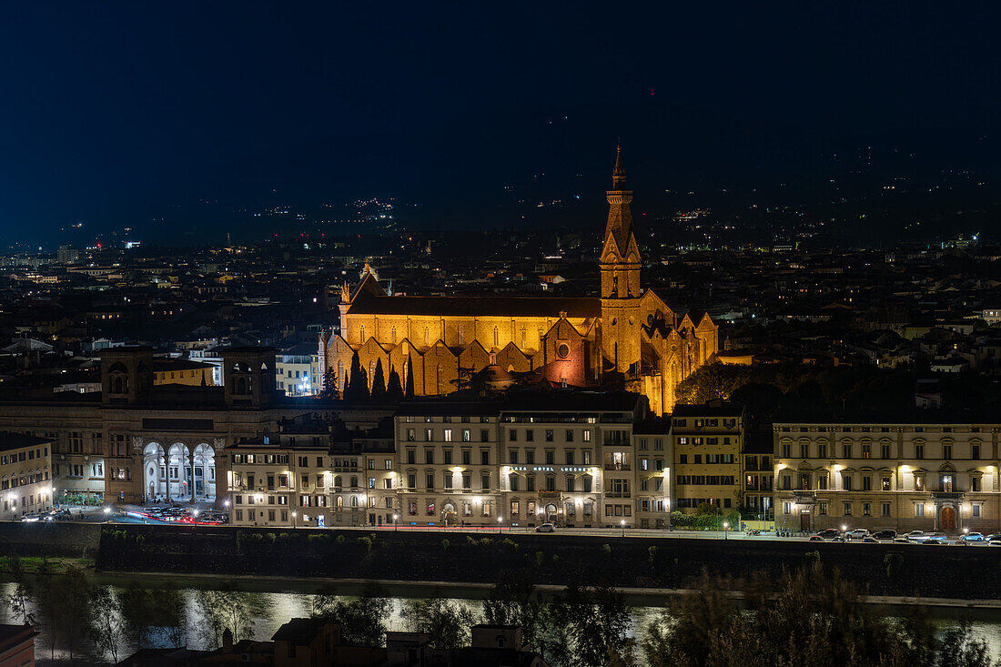 The Basilica di Santa Croce & RIver Arno viewed at night from the Piazzale Michelangelo, Florence, Italy.