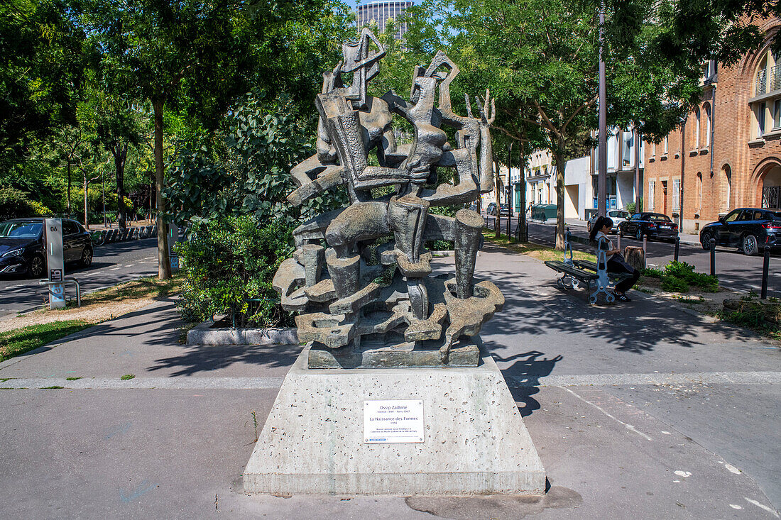 La Naissance des Formes bronze sculpture statue by Ossip Zadkine in Montparnasse-Raspail, Paris 75014, France.