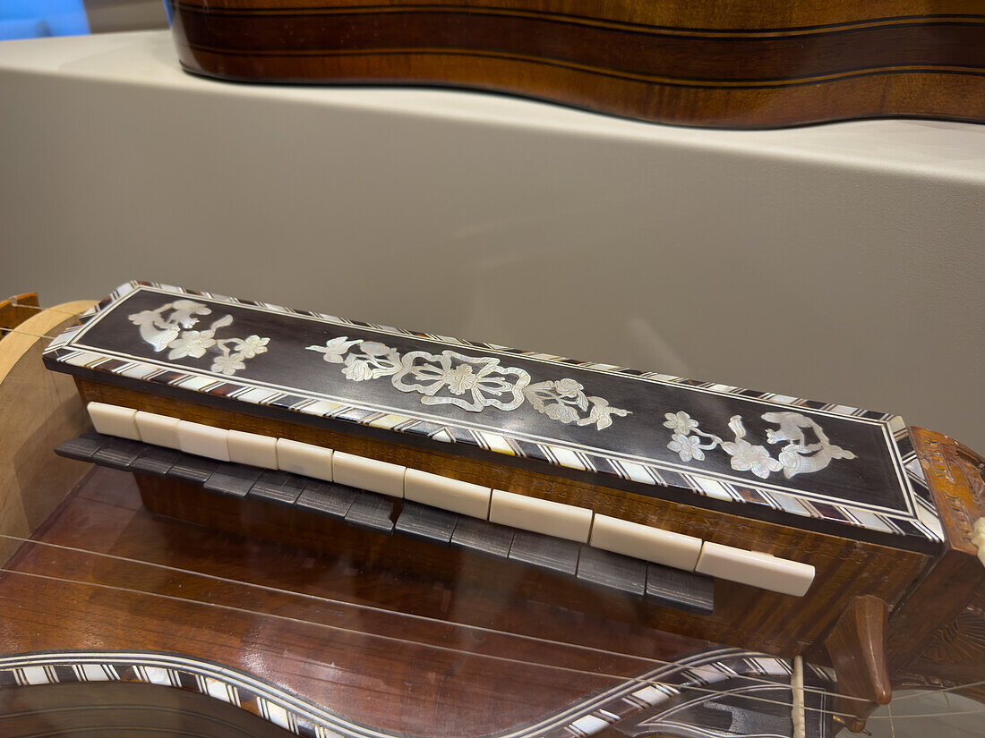 Detail of the keys on an antique hurdy-gurdy in the Accademia Gallery in Florence, Italy. Circa 1775.