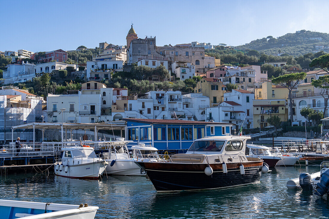 Boats in the Marina Grande in Sorrento, Italy. Behind is the city of Sorrento.