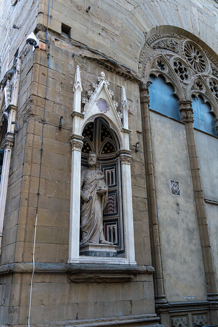 Statue of St. Peter on the Orasanmichele Church in Florence, Italy. St. Peter was the patron saint of the butcher's guild. The statue was sculpted by Filippo Brunelleschi in 1415 A.D.