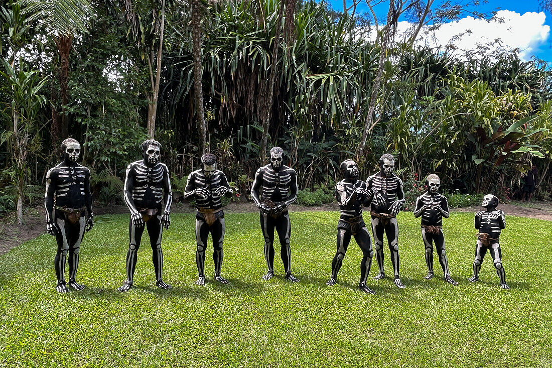 The Skeleton Men from the Omo Bugamo tribe of Papua New Guinea paint their bodies with black and white paint emulating the human skeleton, Chimbu Province, Papua New Guinea