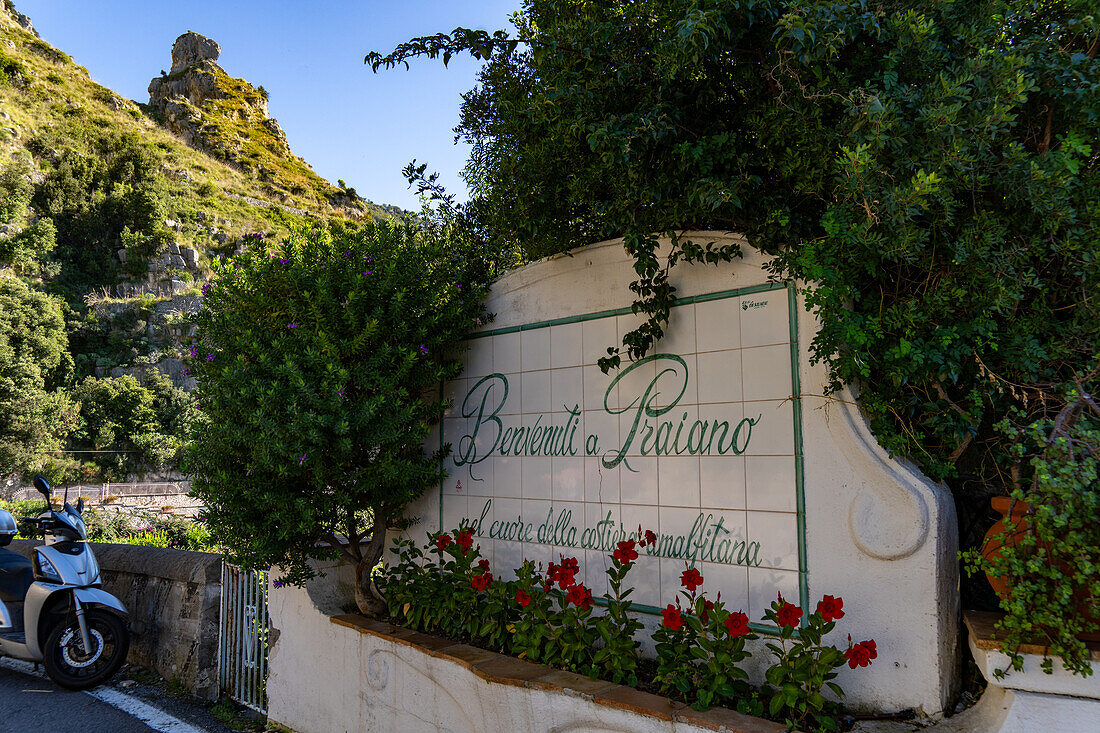 A ceramic tile welcome sign for the resort town of Praiano on the Amalfi Coast, Italy.