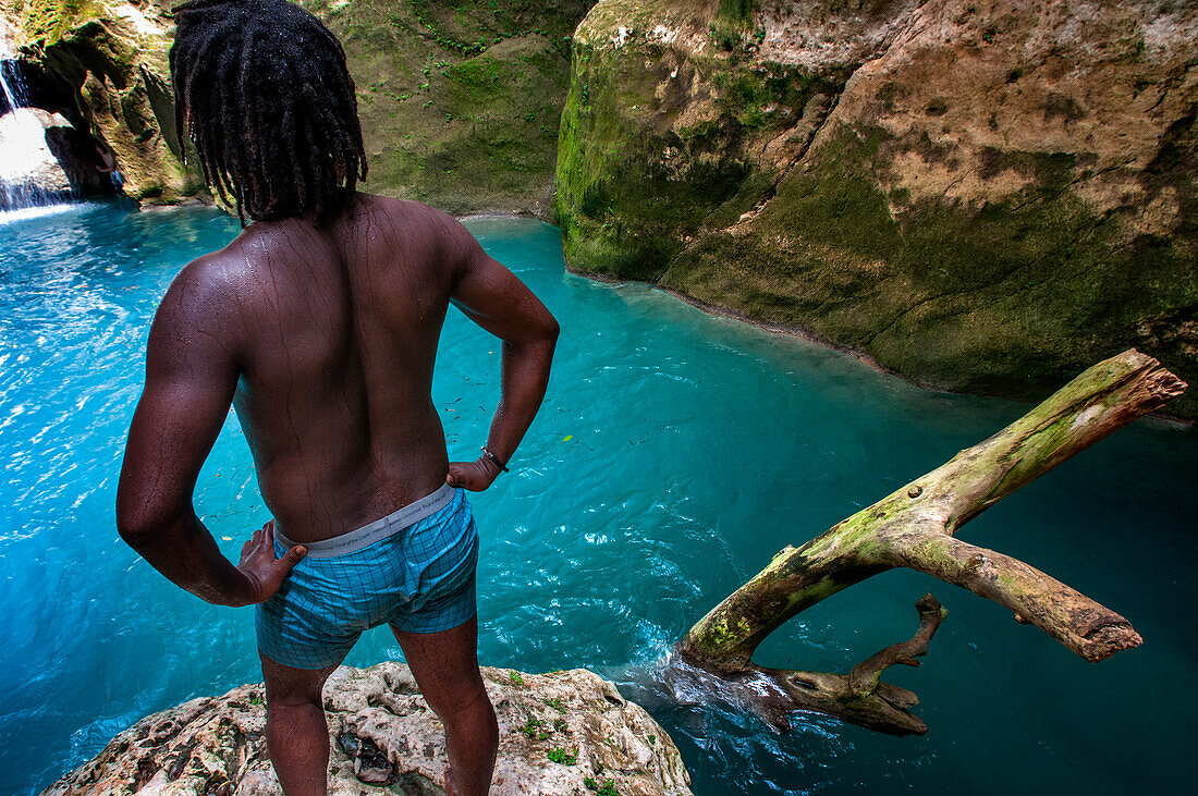 Exploring the cobalt waters of Bassin Bleu waterfall composed of bassin yes, bassin palmiste and bassin clair, Maire de Jacmel, Jacmel, Haiti