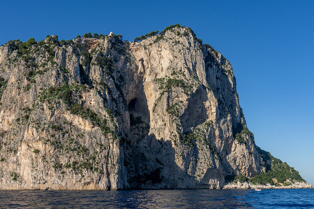 Limestone cliffs of Punta del Monaco, the eastern tip of the island of Capri, Italy.