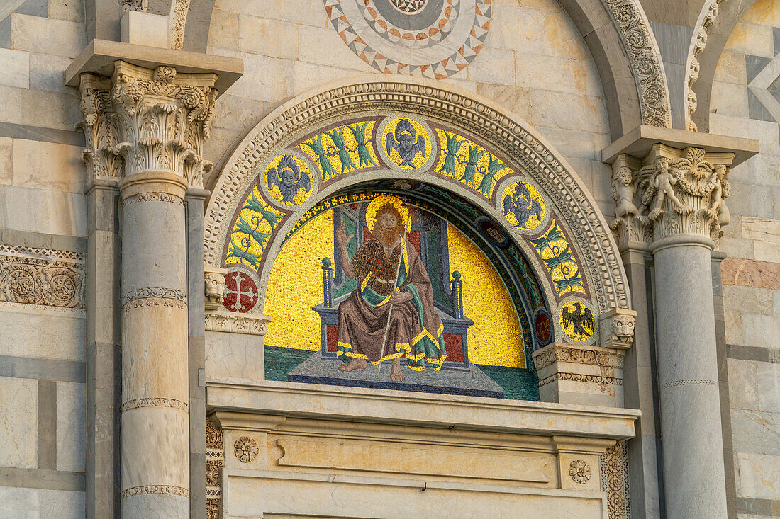 Gold mosaic depicting John the Baptist over the right portal of the west facade of the Duomo of Pisa. Pisa, Italy. Created by Giuseppe Modena da Lucca.