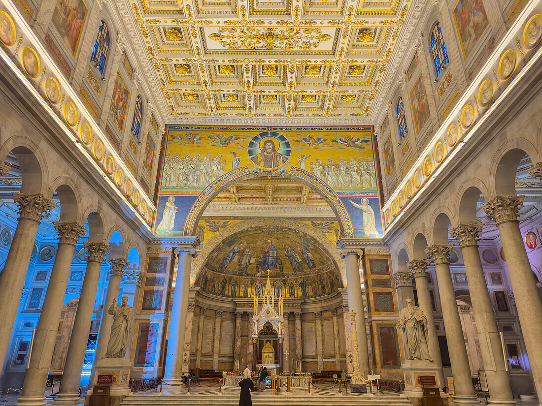 The central nave and triumphal arch in the Basilica of St. Paul Outside the Walls, Rome, Italy.