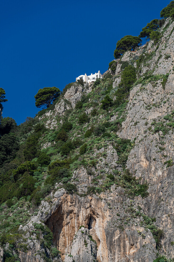 A luxury villa high on a cliff top on the east coast of the island of Capri, Italy.