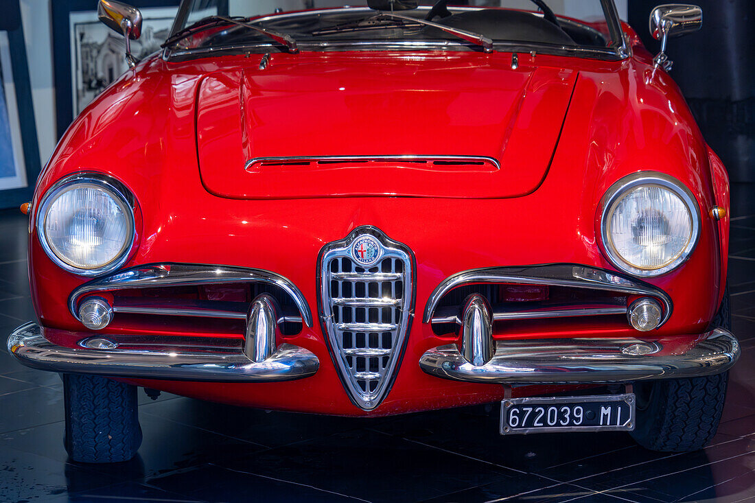 Detail of a 1960s Alfa Romeo Giulia Spyder in a studio in Sorrento, Italy. This car was produced from 1962-1965.