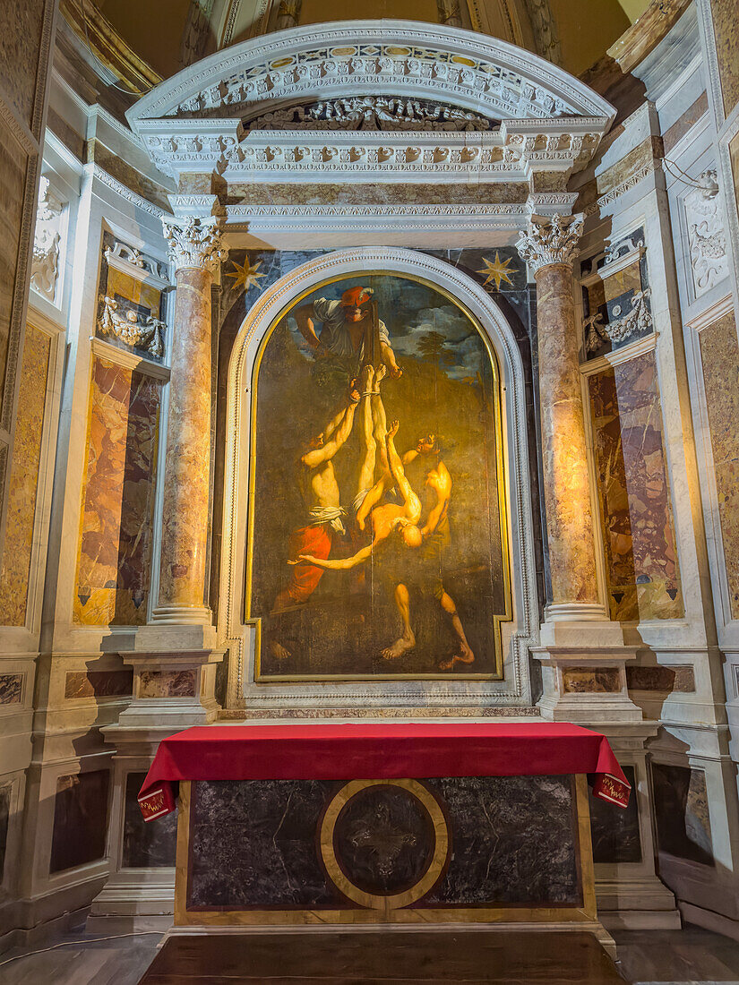 Altar in the Church of St. Paul of Three Fountains at the Abbey of the Three Fountains in Rome, Italy. The painting depicts the crucifixion of St. Peter.