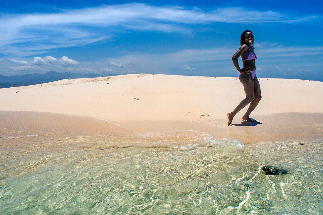 Tourists in a Isolated island uninhabited white sand beach, Île-à-Vache, Sud Province, Haiti