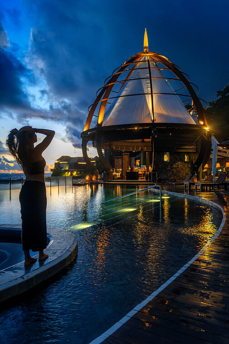 Pool and restaurant of The Ritz-Carlton Langkawi luxury hotel in Langkawi, Malaysia.