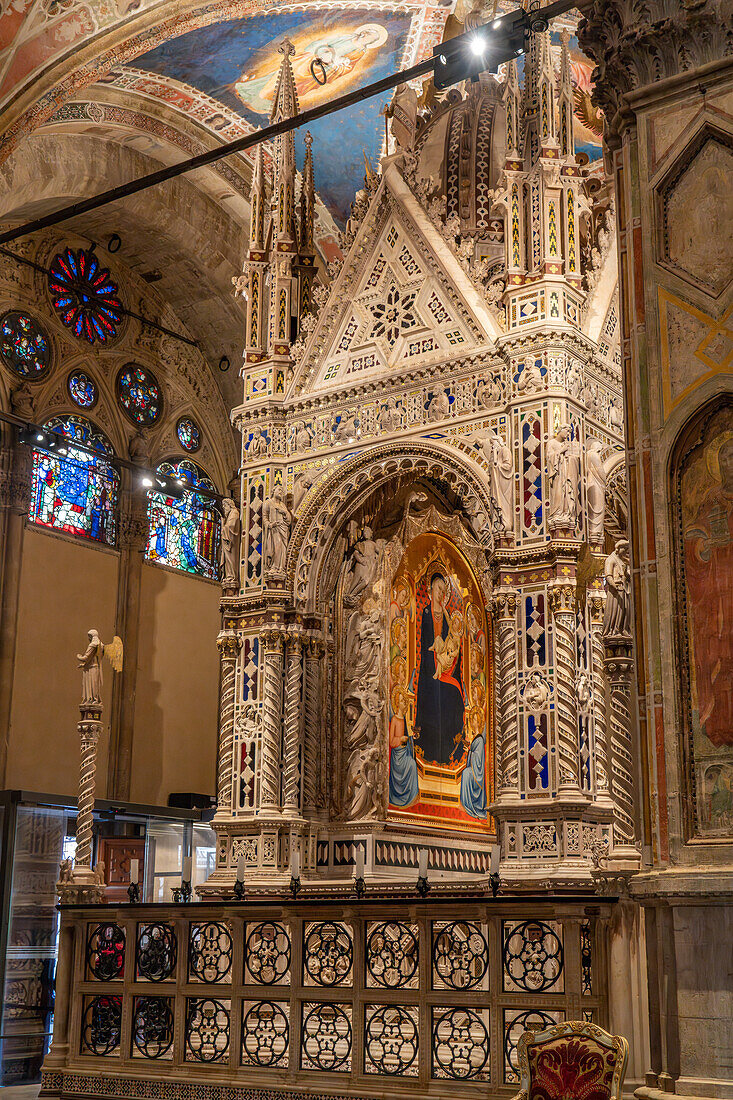 The elaborate carved marble tabernacle in the Orsanmichele Church in Florence, Italy. Created between 1355 and 1359 by Andrea Orcagna.