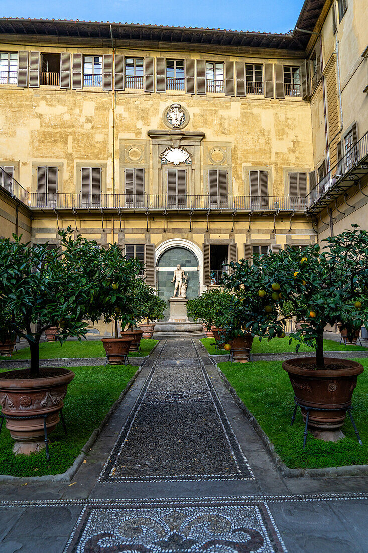 Mosaic designs in the walkway in the gardens of the Palazzo Medici Riccardi. Florence, Italy.