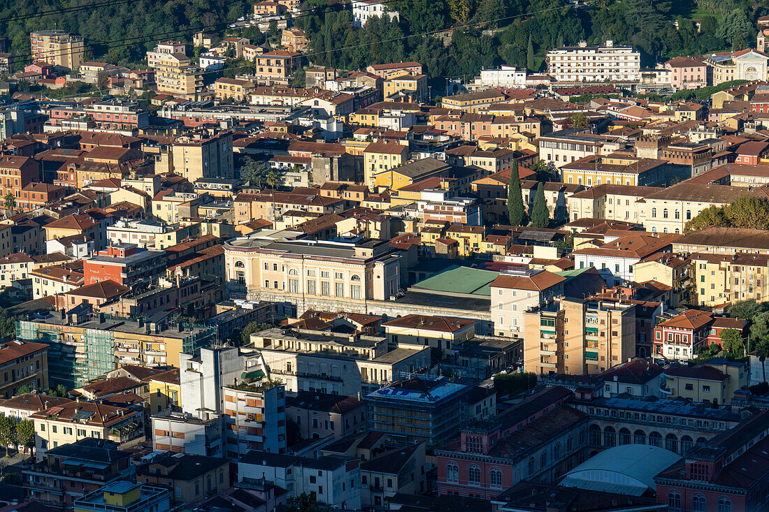 A view over the historic center of the city of Carrara, Italy. At left center is the Casa del Balilla.