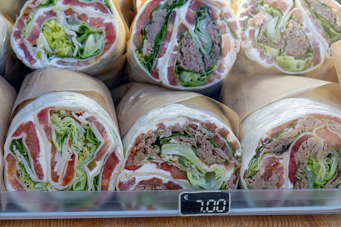 Savory sandwich wraps for sale at a vendor's stand in Anacapri, Italy.