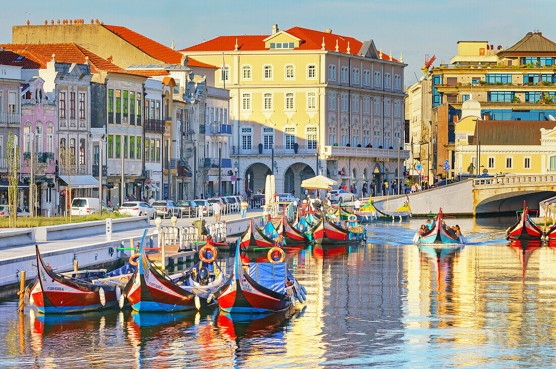 View of moliceiro boats floating on Aveiro river main lagoon, Aveiro, Portugal, Europe